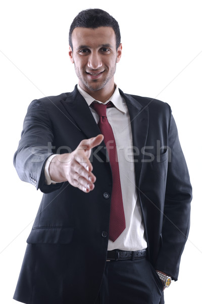 Business man giving you a hand shake Stock photo © dotshock