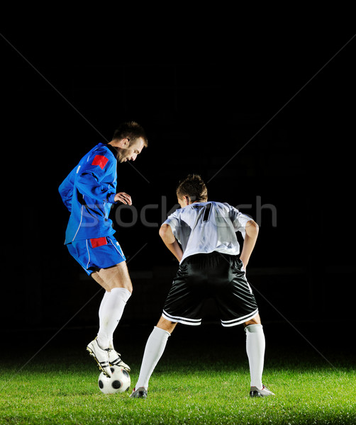 Futbol oyuncular eylem top rekabet çalıştırmak Stok fotoğraf © dotshock