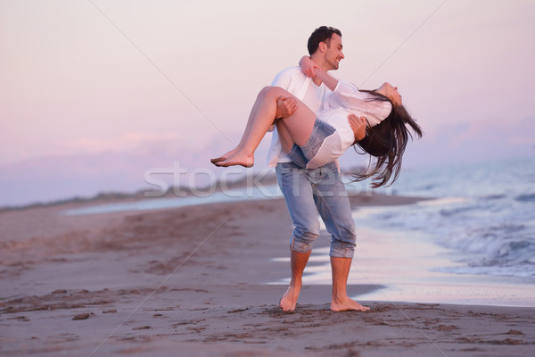 Spiaggia divertimento felice giovani romantica Foto d'archivio © dotshock