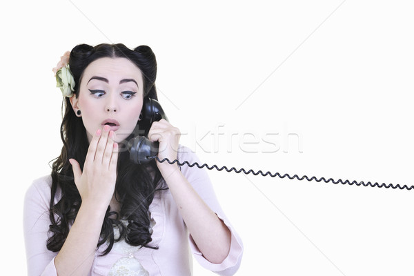 pretty girl talking on old phone Stock photo © dotshock