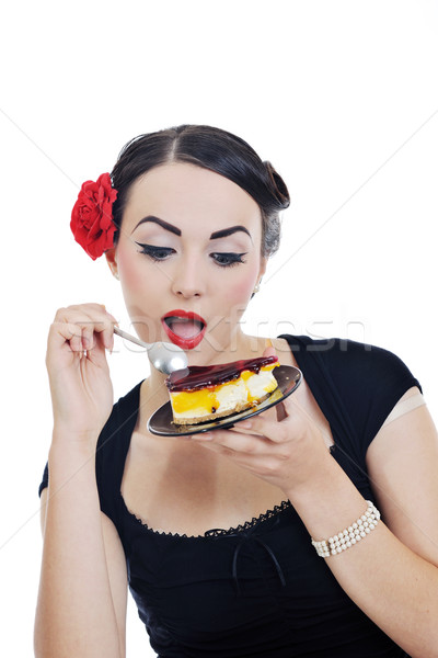 beautiful young woman eat sweet cake Stock photo © dotshock