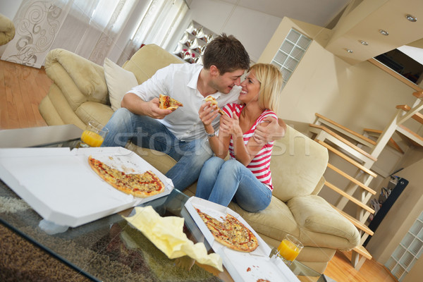 couple at home eating  pizza Stock photo © dotshock