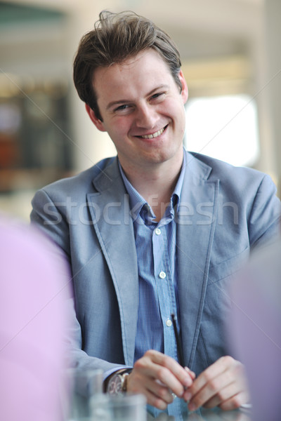 young business man alone in conference room Stock photo © dotshock
