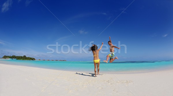 happy young  couple enjoying summer on beach Stock photo © dotshock