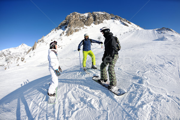 winter portrait of friends at skiing Stock photo © dotshock