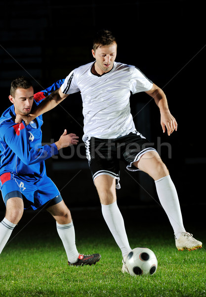 football players in action for the ball Stock photo © dotshock
