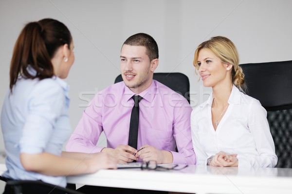 Stock photo: Group of young business people at meeting