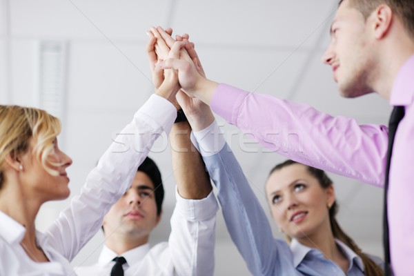 Stock photo: business people group joining hands