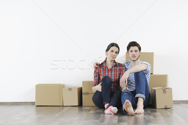 Young couple moving in new home Stock photo © dotshock