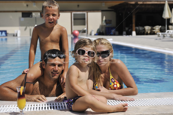 [[stock_photo]]: Heureux · jeunes · famille · amusement · piscine · vacances · d'été
