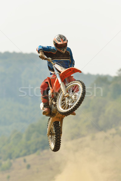 Motocross bicicletă rasă viteză putere extremă Imagine de stoc © dotshock