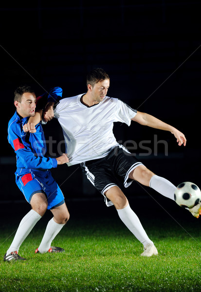 football players in action for the ball Stock photo © dotshock