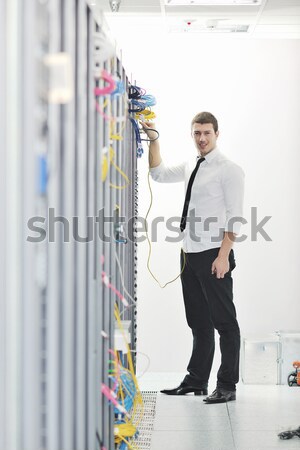 Falante telefone rede quarto jovem homem de negócios Foto stock © dotshock