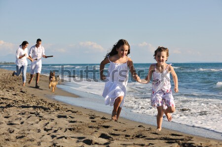 Foto d'archivio: Felice · giovani · famiglia · divertimento · spiaggia · vivere