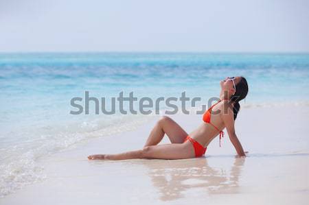 beautiful girl on beach have fun Stock photo © dotshock