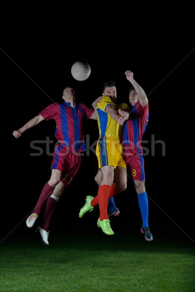Piłkarz kopać piłka piłka nożna stadion dziedzinie Zdjęcia stock © dotshock