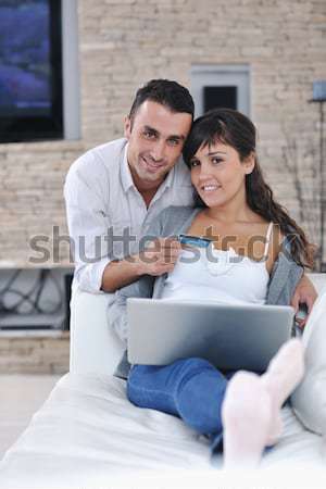 [[stock_photo]]: Joyeux · couple · détendre · travaux · ordinateur · portable · modernes