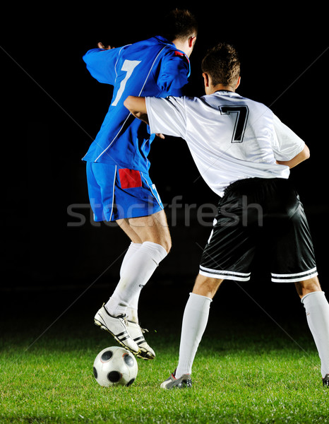 Futbol oyuncular eylem top rekabet çalıştırmak Stok fotoğraf © dotshock