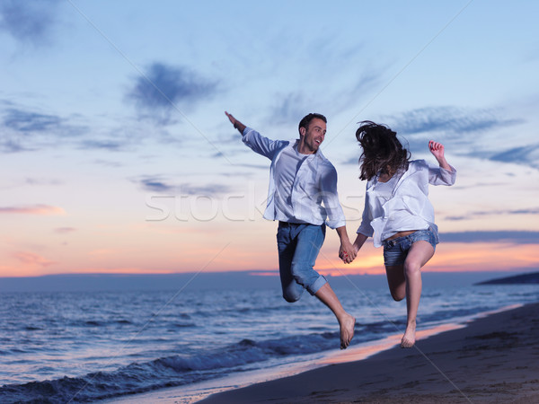 Stock photo: young couple  on beach have fun