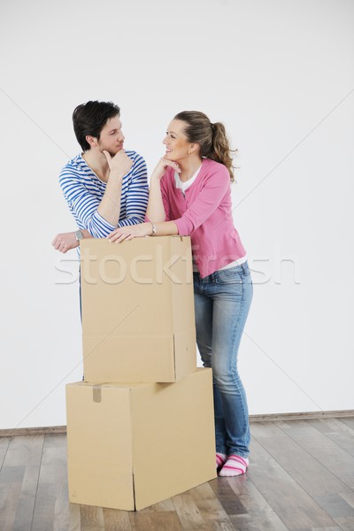 Young couple moving in new home Stock photo © dotshock