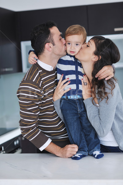 Gelukkig jonge familie leuk home ontspannen Stockfoto © dotshock