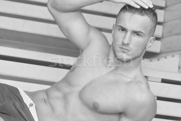 attractive young man in sauna Stock photo © dotshock