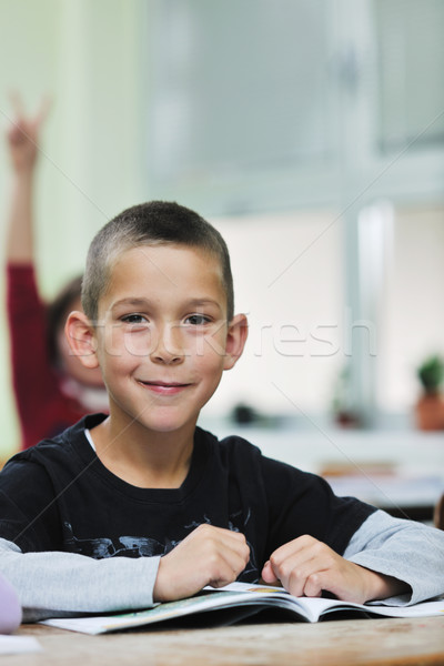 happy young boy at first grade math classes  Stock photo © dotshock