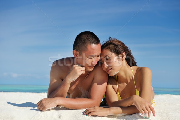 group of happy young people have fun on bach Stock photo © dotshock
