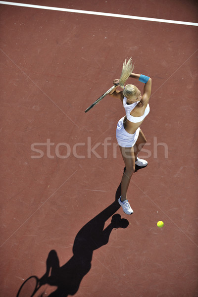 Stock photo: young woman play tennis outdoor