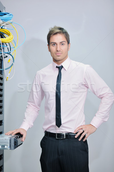 Stock photo: young it engineer in datacenter server room