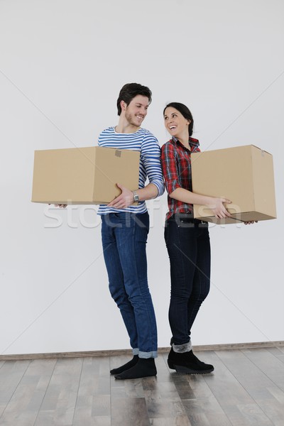 Young couple moving in new home Stock photo © dotshock