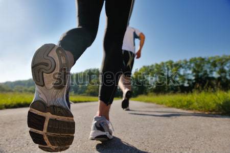 Fiatal pér jogging park reggel egészség fitnessz Stock fotó © dotshock