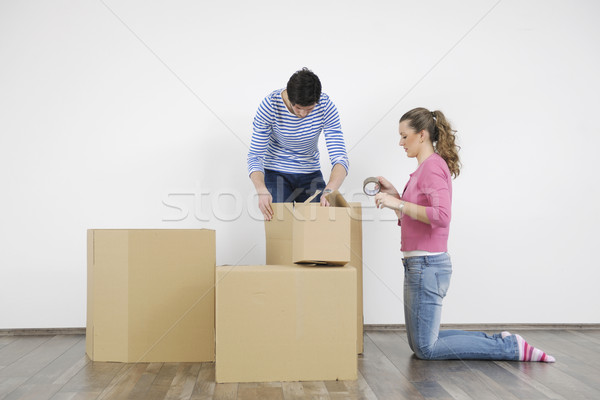 Young couple moving in new home Stock photo © dotshock