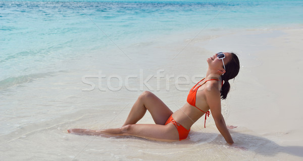 beautiful gril on beach have fun Stock photo © dotshock