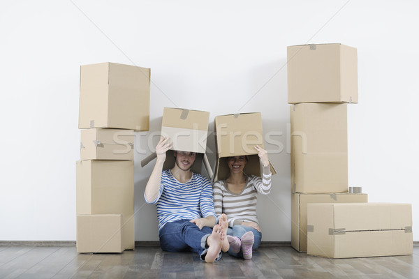 Young couple moving in new home Stock photo © dotshock