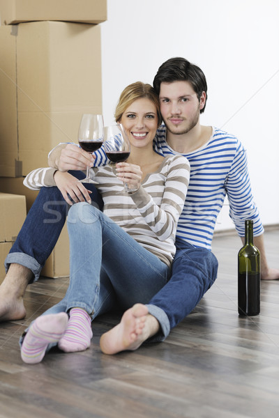 Stock photo: Young couple moving in new home