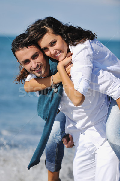 Stock photo: happy young couple have fun at beautiful beach