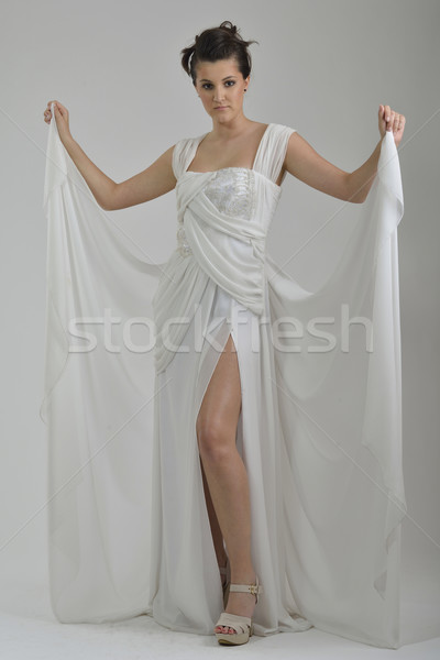 élégante femme mode robe posant studio [[stock_photo]] © dotshock