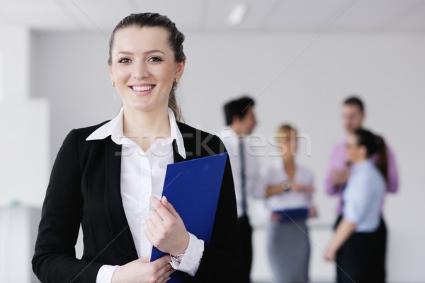 ビジネス女性 立って スタッフ 成功した 現代 明るい ストックフォト © dotshock