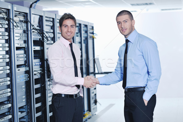 it engineers in network server room Stock photo © dotshock