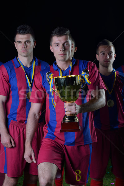 Stock photo: soccer players celebrating victory