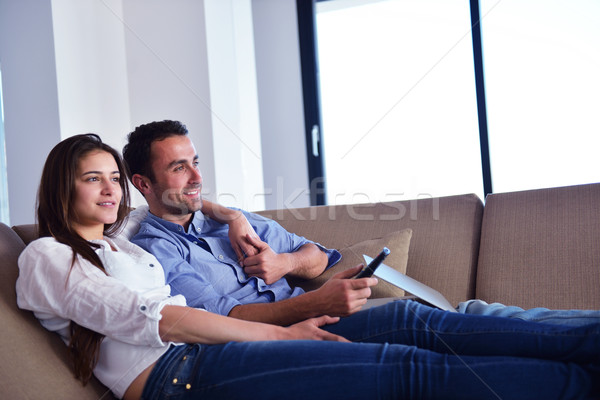 Couple on sofa Stock photo © dotshock