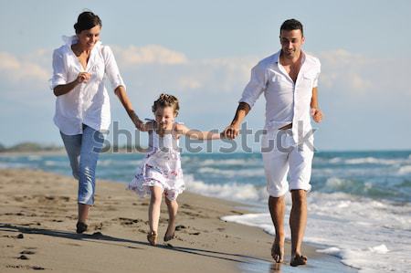 happy child group playing  on beach Stock photo © dotshock