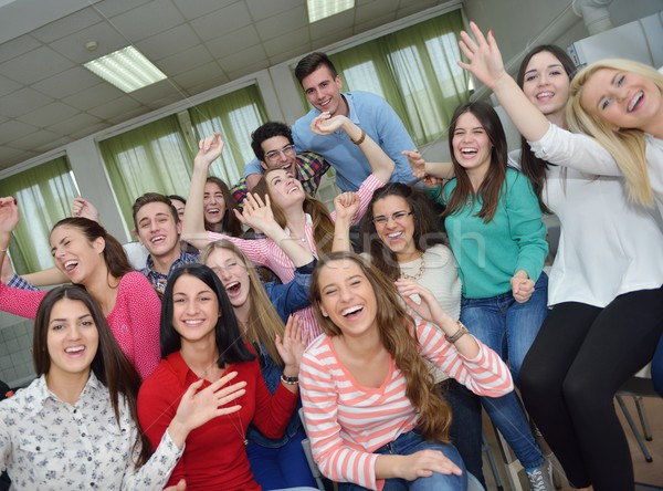 Stock photo: happy teens group in school