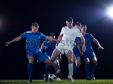 Futbol oyuncular eylem top rekabet çalıştırmak Stok fotoğraf © dotshock