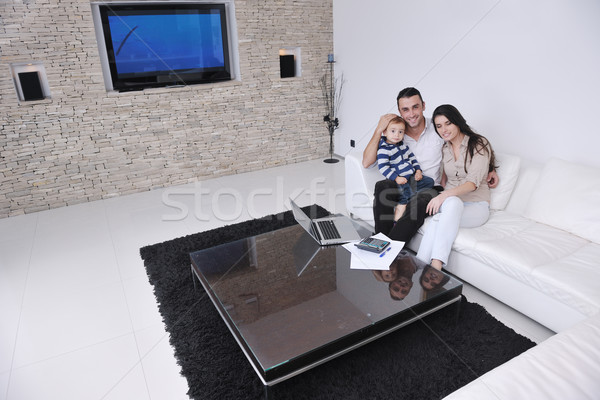Boldog fiatal család jókedv tv megnyugtató Stock fotó © dotshock