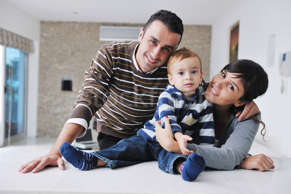 Stock photo: happy young family have fun  at home