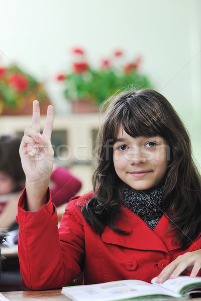 happy child  in schoold have fun and learning leassos Stock photo © dotshock