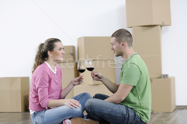 Young couple moving in new home Stock photo © dotshock