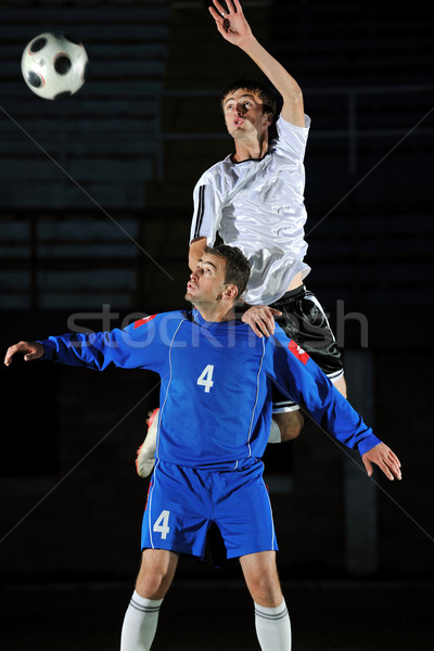 Piłka nożna gracze działania piłka konkurencja uruchomić Zdjęcia stock © dotshock